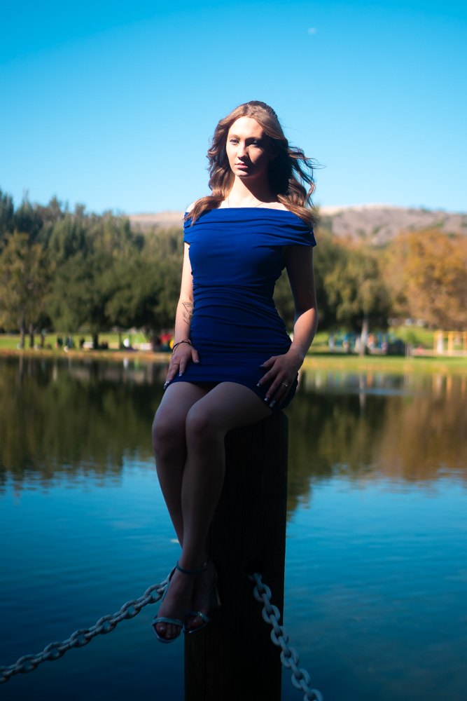 Seated on a piling, direct gaze
