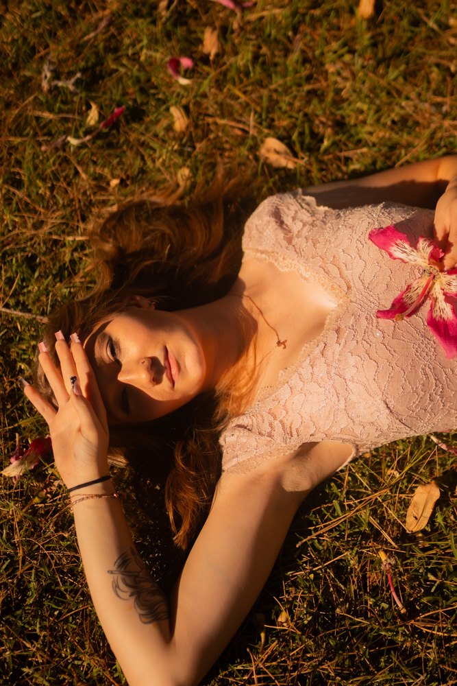 Overhead in grass, hand raised
